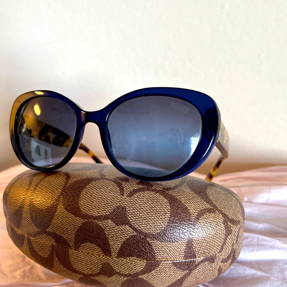 Coach sunglasses.  Deep blue frame with tortoise shell arms.